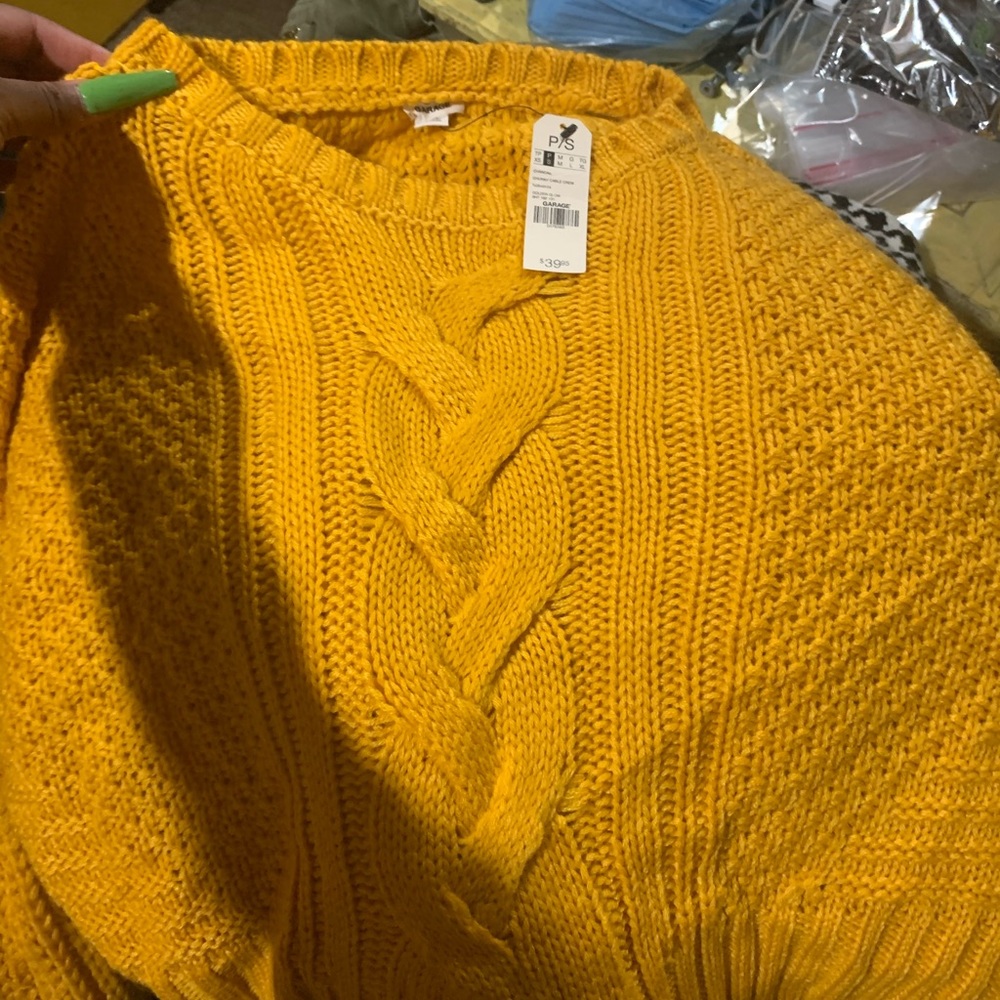 Small yellow sweater from garage
